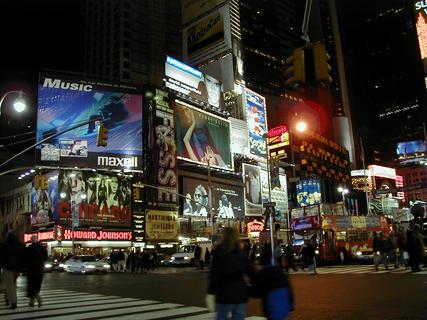 Times Square at night<br>Location: <a href="https://www.google.com/maps/search/?api=1&query=40.7585,-73.98503" target="_new">West 46th St and 7th Ave</a>